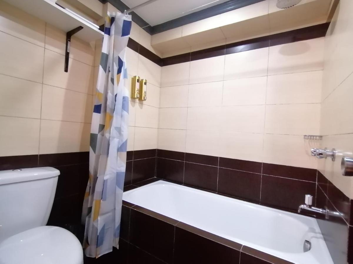 Condo Azur Suites E507 Near Airport, Netflix, Stylish, Cozy With Swimming Pool ماكتان المظهر الخارجي الصورة